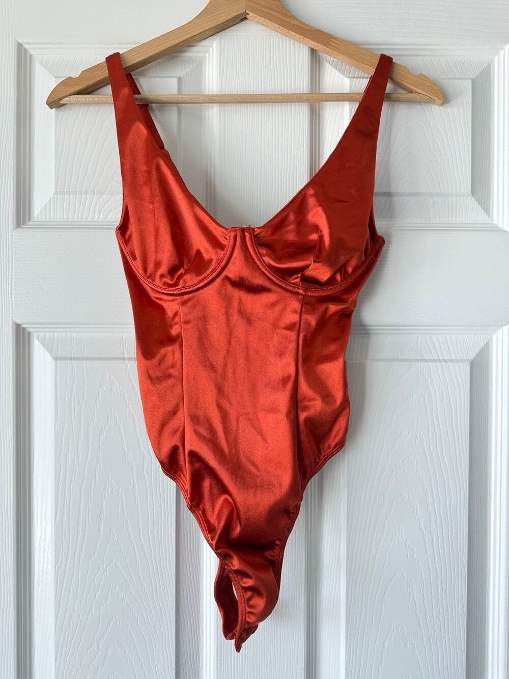 rust orange bodysuit